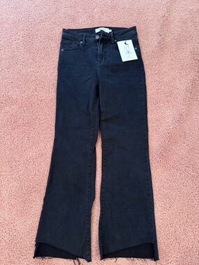 High-Rise Black Flare Jeans with Raw Hem